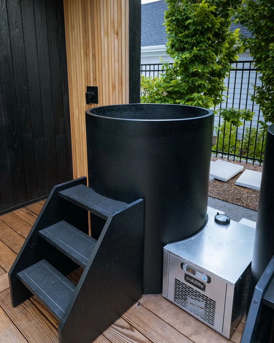 Separate black cold plunge, entry steps and chiller on Colin Wright’s added deck