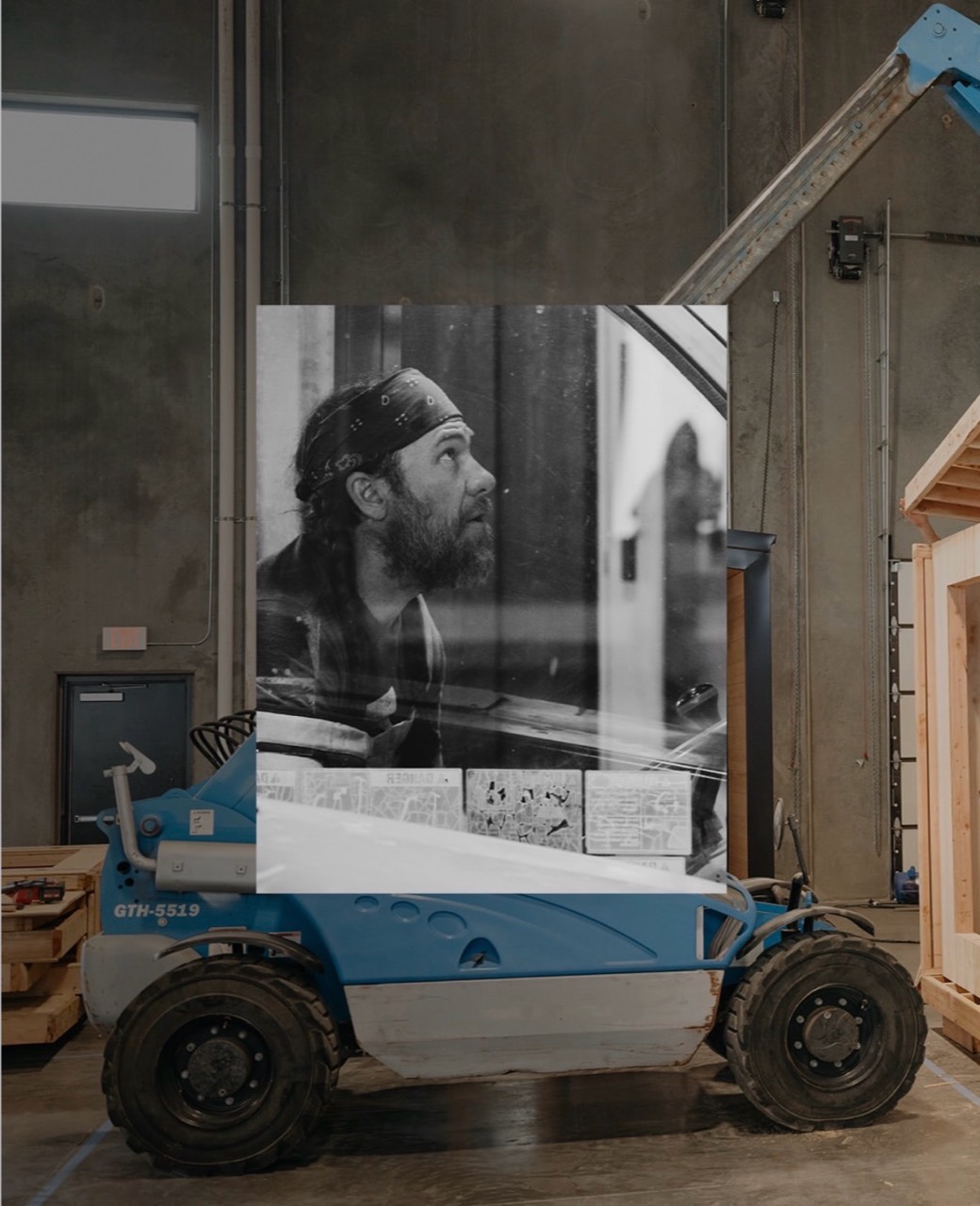 A black-and-white portrait layered over a photograph of the workshop and lifting equipment