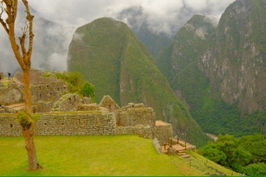 Terraces and cloud over the ruins at Machu Picchu
