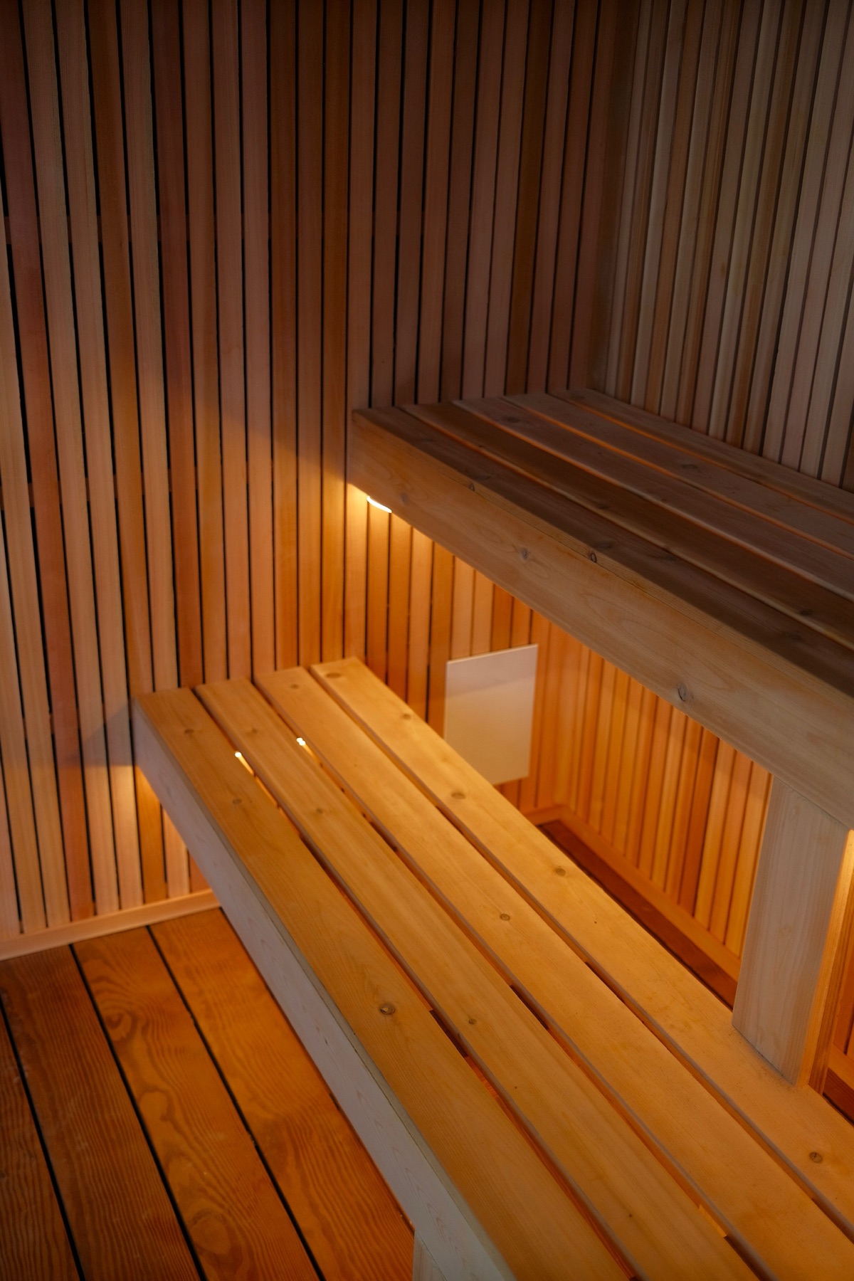 Two-tier Western Red Cedar benches inside the 212 Designer