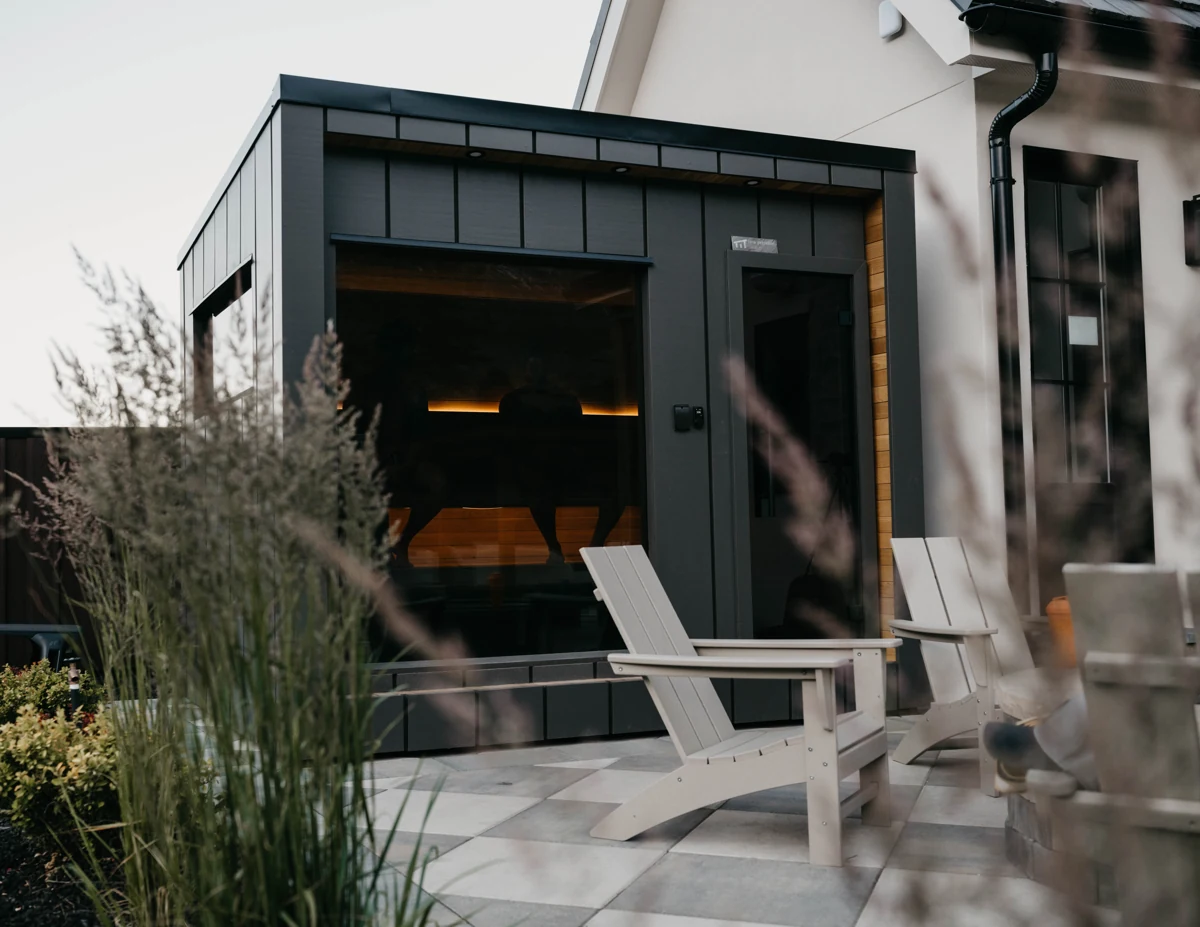 Black 212 Essential beside a landscaped stone patio