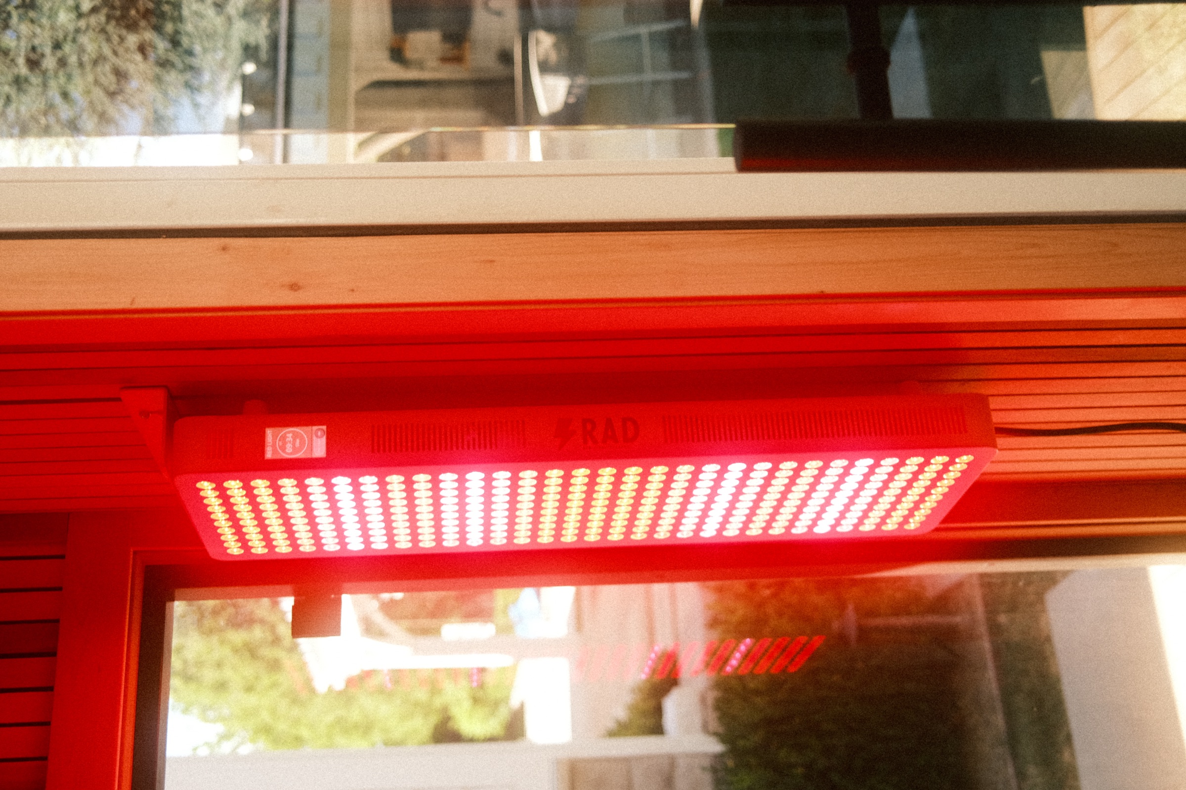 Detail of the illuminated optional red light panel inside the sauna