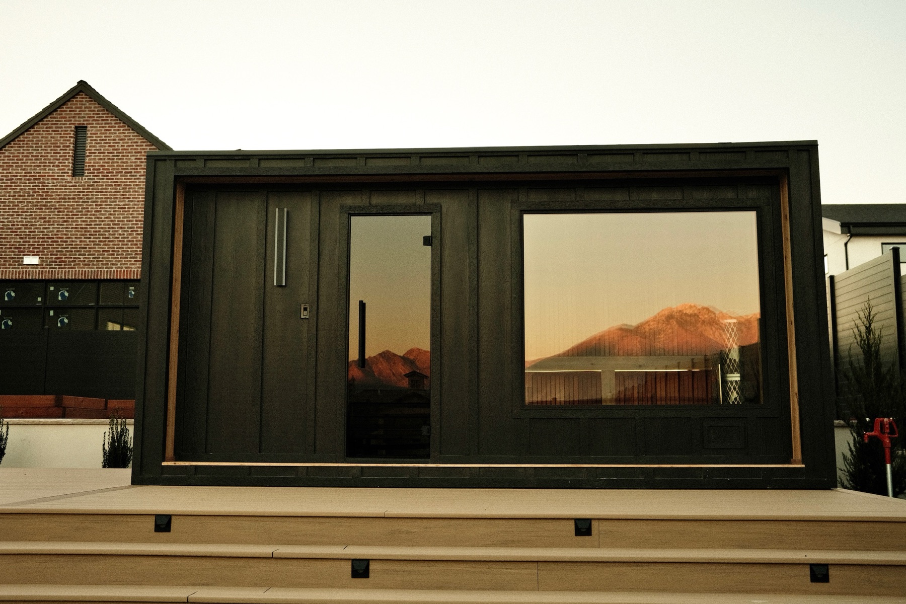Thermal Suite Essential at sunset with mountain reflections
