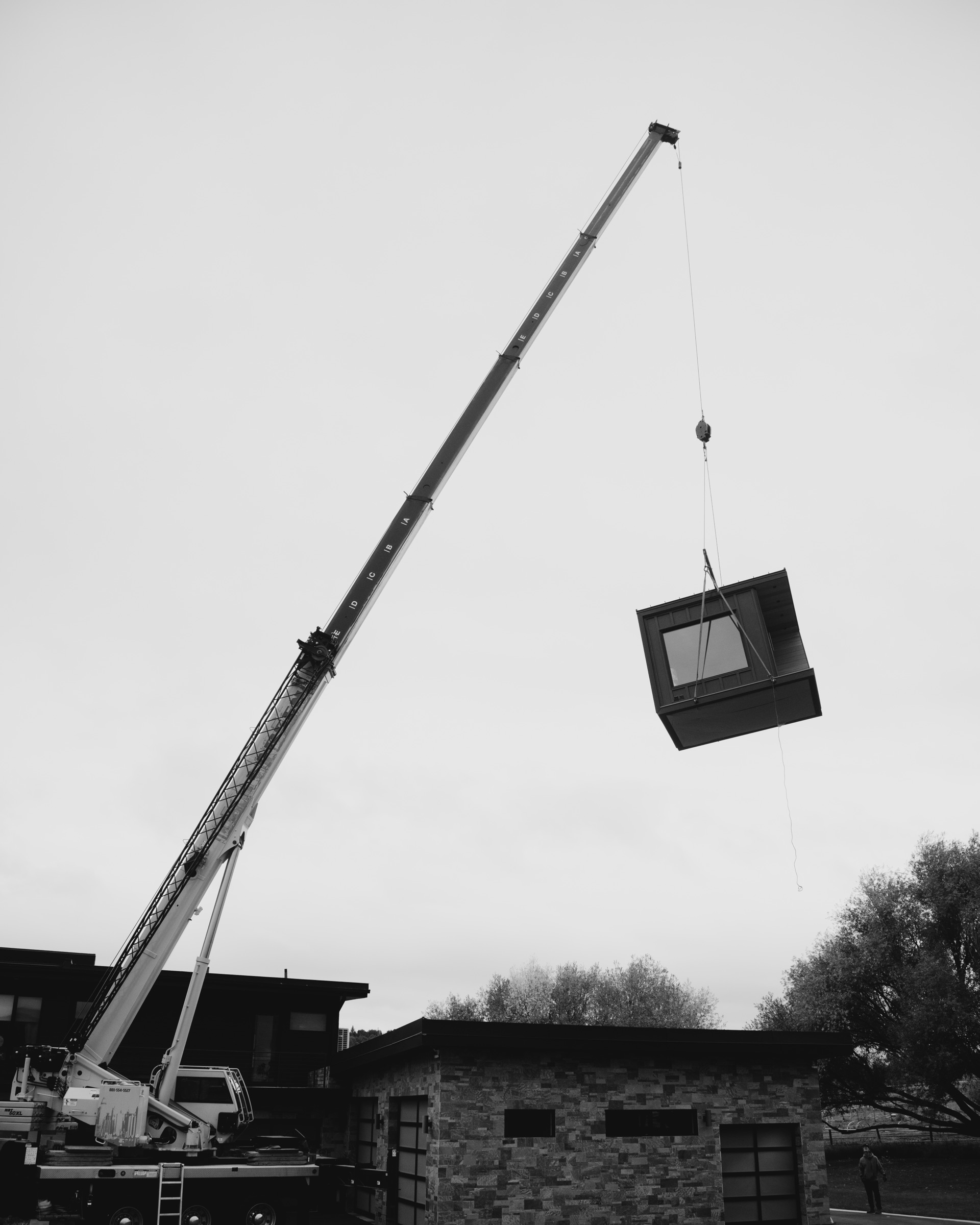 The sauna in the air against an overcast sky
